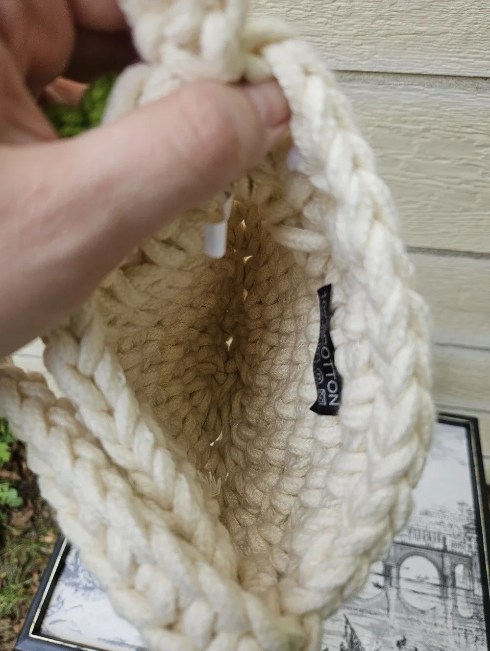 cream colored chunky crochet bag with flowers